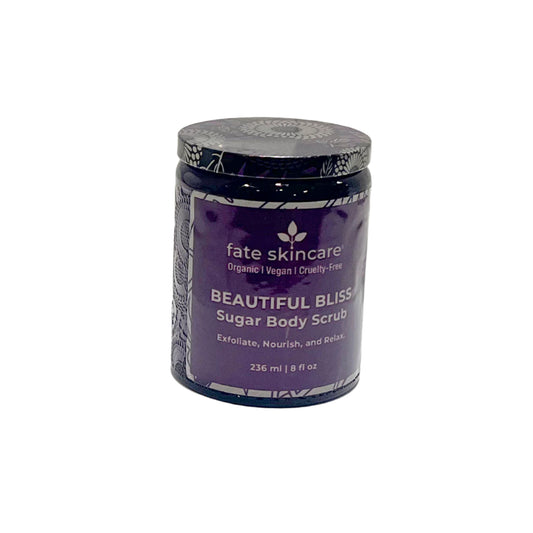 A jar of Fate Skincare's Beautiful Bliss Sugar Body Scrub with a purple label and black lid.