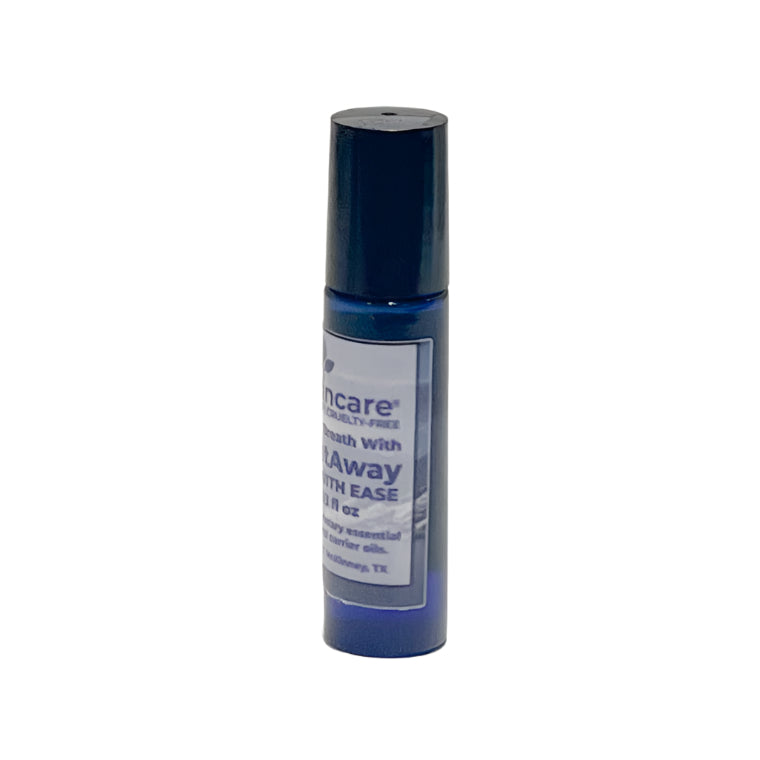 A side view of the CongestAway Breathe Ease Roller bottle, showing a partial view of the label with text detailing the product’s natural carrier oils and essential oil blend. The deep blue glass gives the packaging an elegant and soothing appearance.