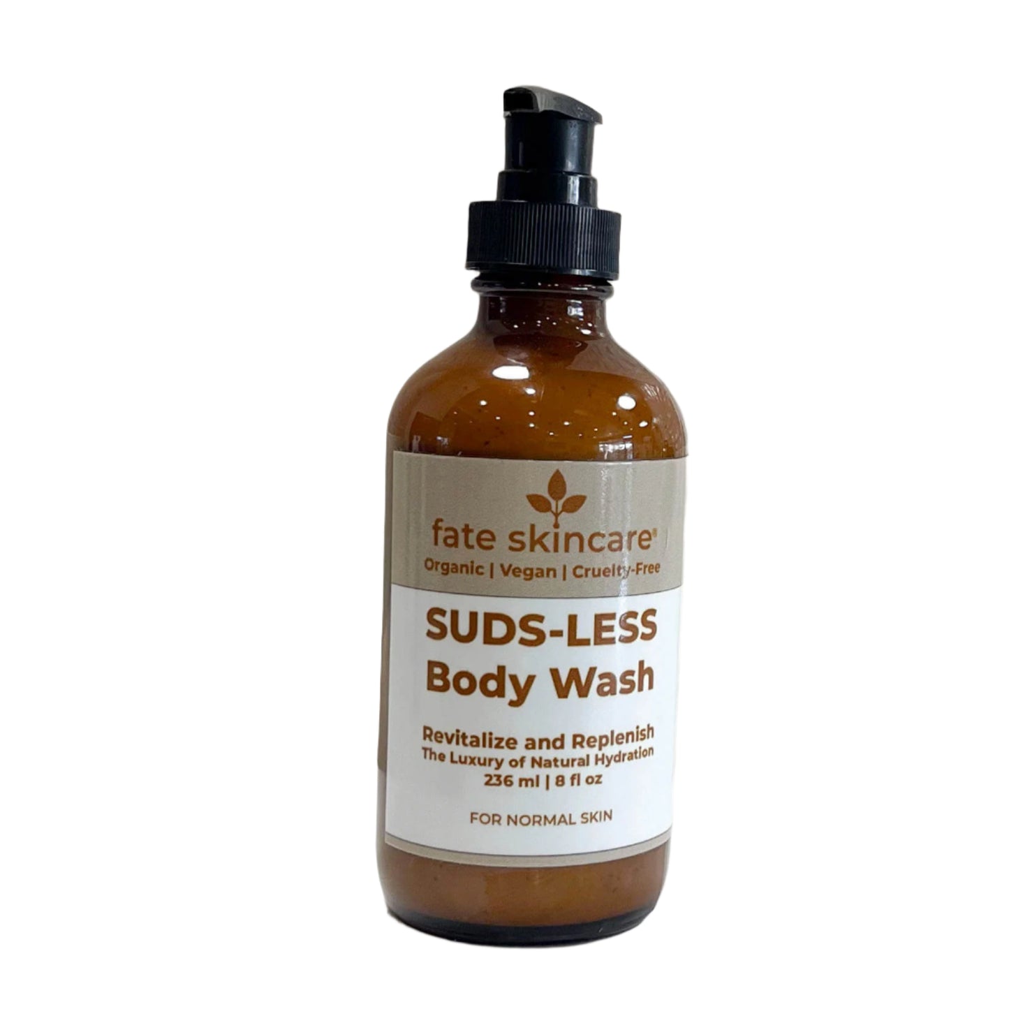 A brown glass bottle with a black pump dispenser, featuring a beige label with brown text. The label displays the brand "Fate Skincare" and the product name "Suds-Less Body Wash." It describes the product as offering "Revitalize and Replenish - The Luxury of Natural Hydration." The bottle contains 236 ml (8 fl oz) and is designed for normal skin.