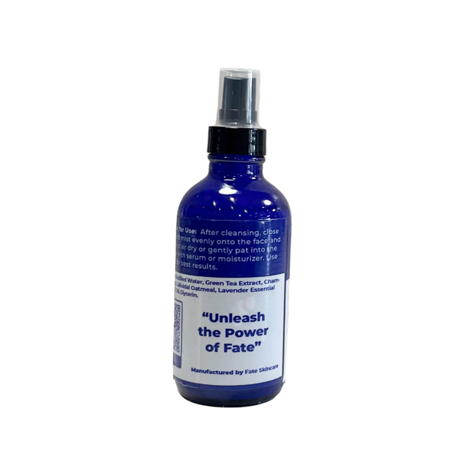  A side view of the "Green TeaBlossom Hydrating Tonic" bottle with the brand's tagline, "Unleash the Power of Fate," prominently displayed. The label also emphasizes that the product is manufactured by Fate Skincare.