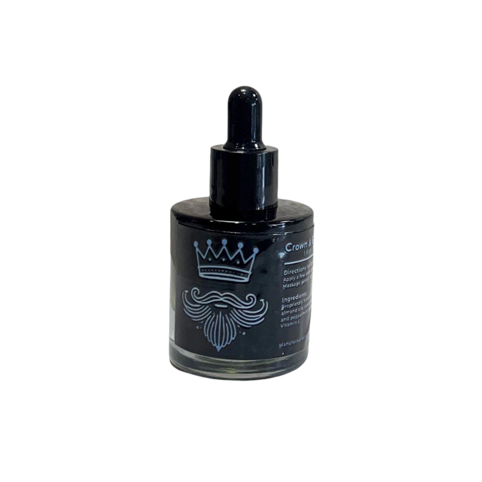 A black glass dropper bottle of "Crown & Beard Oil" by Fate Skincare, featuring a minimalist design with a crown and beard illustration on the label. The bottle is placed on a white surface with a textured white background.