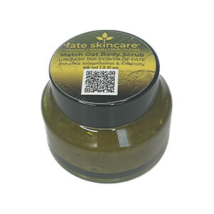 Experience the rejuvenating power of Fate Skincare's Soothing Matcha Oat Scrub in a chic green olive glass container topped with a sleek black metal lid. The white label showcases the product name, with Fate Skincare's iconic logo elegantly centered, promising a harmonious blend of matcha and oat goodness for a soothing and revitalizing skincare ritual.