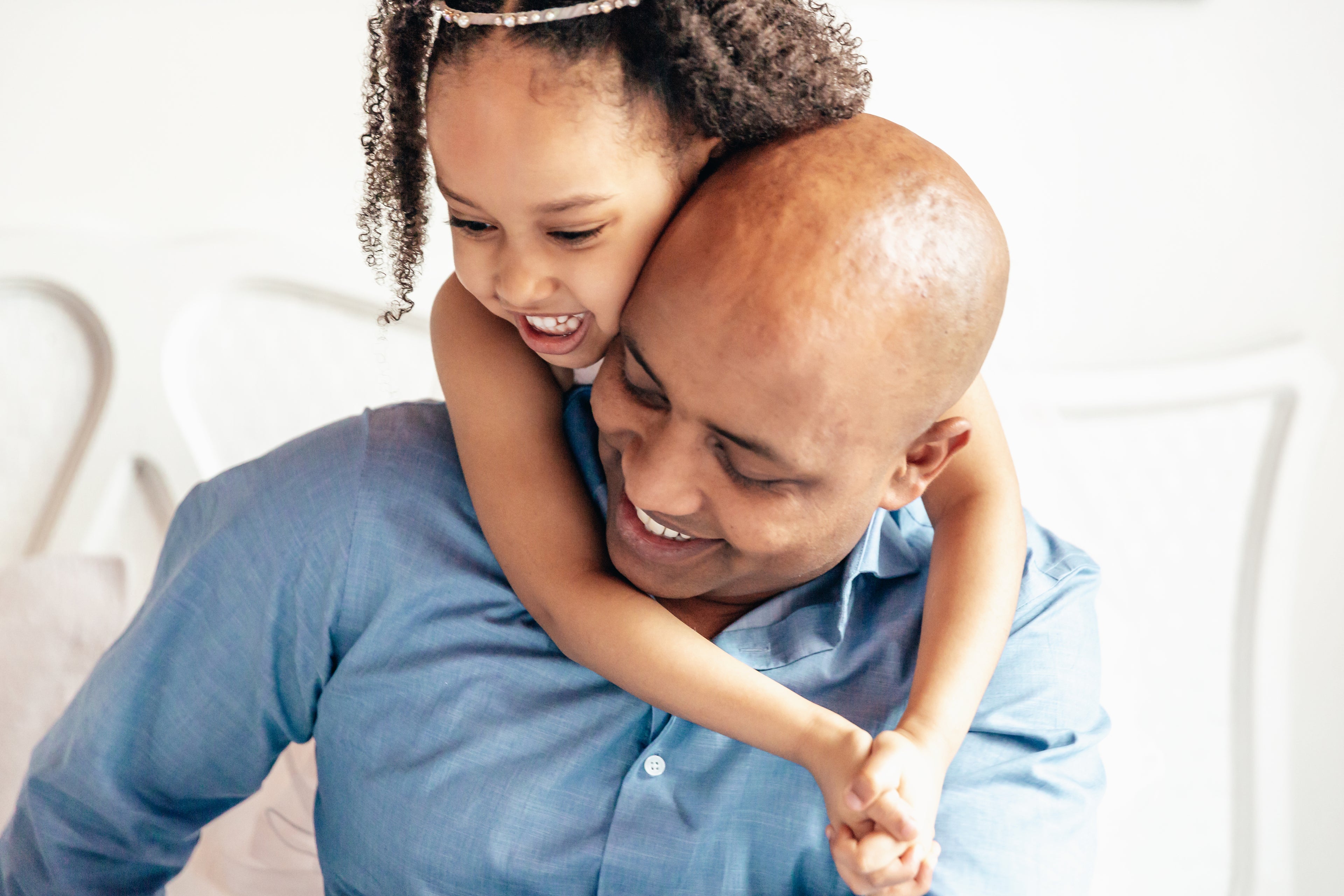 Daughter rids dads back after bathing with Fate Skincare's Beautiful Bliss Sugar Body Scrub.